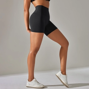 Side view of black high-waisted yoga shorts with butt-lifting and tummy control fit
