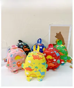 Collection of colorful cartoon dinosaur backpacks for kids in various bright shades