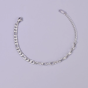 Detail of silver chain bracelet with K18 tag, lobster clasp and adjustable link chain