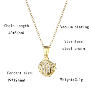 Detail view of gold fish pendant with dimensions 19x12mm and 40+5cm chain length
