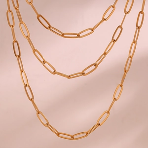 Detail of 18K gold-plated stainless steel paperclip chain with large oval metal links