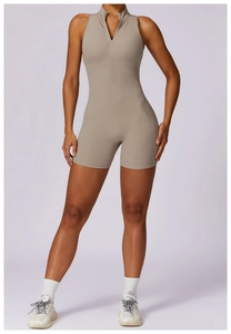 Detailed front view of high-elastic yoga romper featuring zipper collar and khaki fabric
