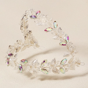 Detail of silver twisted wire hairband with iridescent rhinestones and beads