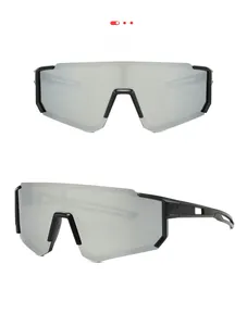 Close-up of matte black cycling sunglasses with silver mirrored one-piece shield lens