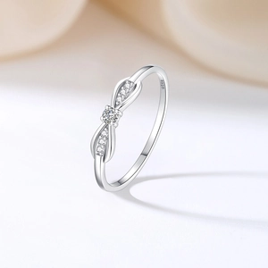 Elegant S925 sterling silver bow ring with sparkling cubic zirconia in a minimalist style