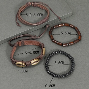 Detail view of four-piece leather bracelet set with shell and wood beads dimensions