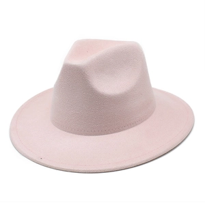 Detail view of pink wide brim fedora hat with clean stitched edges and felt texture