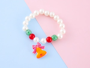 Detailansicht der Weihnachts-Perlenarmband mit gelber Glocke und rosa Schleife
