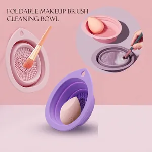 Collapsible silicone makeup brush cleaning bowl with textured scrubbing surface