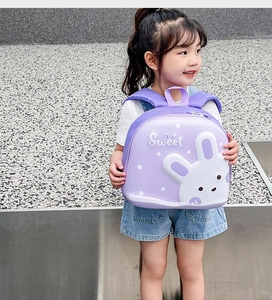 Detail of purple EVA hardshell backpack with a 3D cute white rabbit and Sweet logo