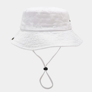 Detail of white cotton bucket hat featuring reinforced brim and adjustable drawstring