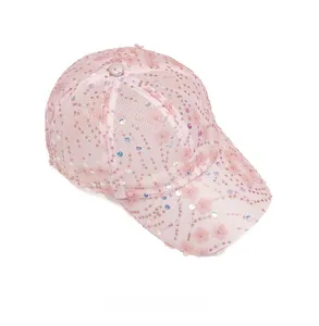 Detailed view of pink mesh baseball cap with floral accents and sparkling sequins