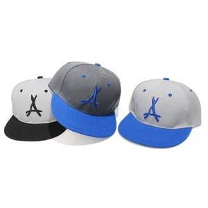 Detailed embroidery of letter A on three types of multi-color snapback hats with flat brims