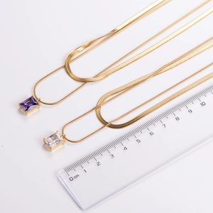 Double layer gold snake chain necklace with emerald cut zircon pendants and ruler scale