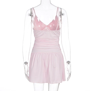 Detailed back view of pink ruched bodycon dress with slim straps and fine pleats