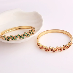 Elegant 18K gold plated bangle with marquise green and red zircon gemstones