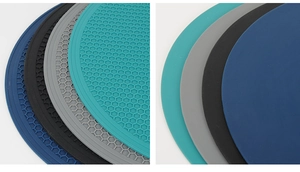 Front and back detail of four colorful round silicone honeycomb heat-resistant table mats