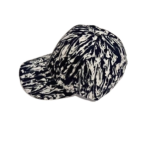 Street style baseball cap with black and white abstract marble pattern on white background