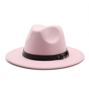 Detailed view of pink fedora hat with brown leather band and bronze metal buckle
