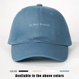 Classic blue cotton baseball cap with white Do Not Disturb embroidery and adjustable strap