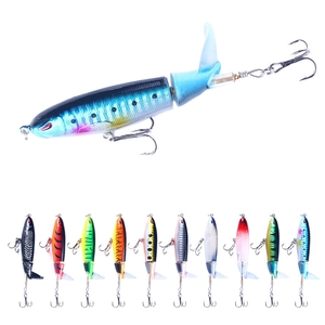 Macro shot of colorful lure frogs with sharp metal hooks and rotating sequin tails