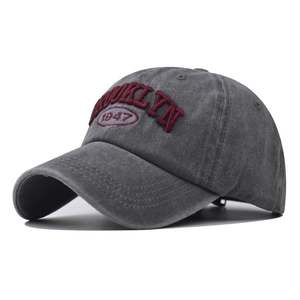 Detail of Brooklyn 1947 red 3D embroidery on washed grey cotton baseball cap