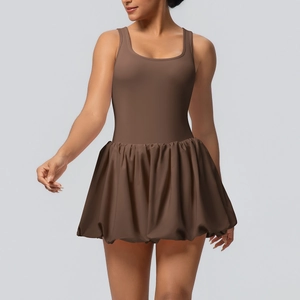 Detailed front view of brown sleeveless sports dress with bubble hem and built-in shorts
