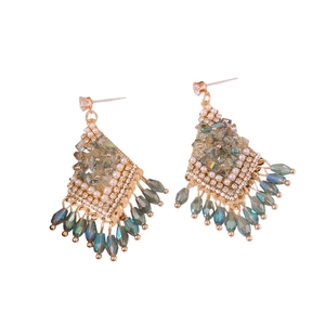 Bohemian silver needle drop earrings with champagne stones and teal glass tassels