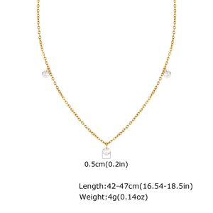 Close-up of golden necklace with clear zircon stones showing dimensions 42-47cm and 4g weight