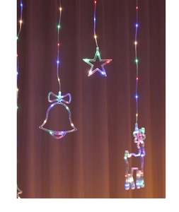 Detail of LED curtain lights featuring colorful Christmas star, bell, and reindeer shapes