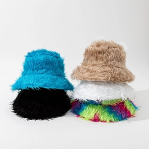 Detailed close-up showing plush long fur bucket hats in various colors for winter warmth