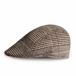 Detailed view of brown checkered pattern fabric and texture on the flat cap for men