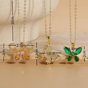 Three butterfly zircon necklaces in gold finish with pink, white and green stones