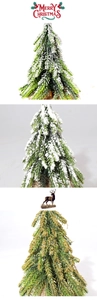 Detailed views of mini artificial Christmas trees with snow, gold glitter, and burlap base