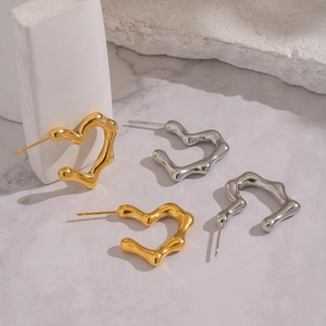 Minimalist heart-shaped lava texture stud earrings in gold and silver finish set