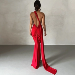 Rear view of red one-shoulder backless maxi dress with elegant ruching and long trailing sash