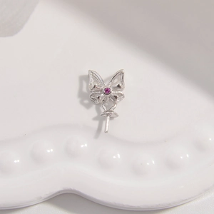 Detailed silver butterfly pendant setting with a pink gemstone and a needle base for DIY