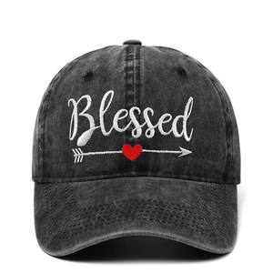 Washed dark grey cotton baseball cap with white Blessed embroidery and red heart