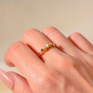Elegant gold sterling silver open ring featuring a row of colorful zircon gemstones