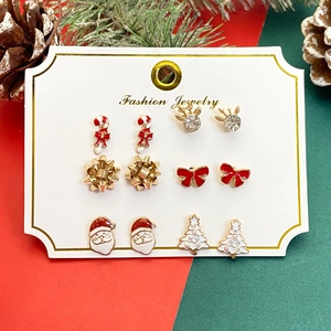 6-pair Christmas stud earrings set featuring Santa, reindeer, and festive trees on a card