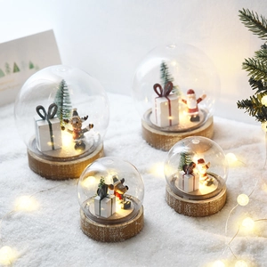 Nordic Christmas reindeer night light with snow globe effect and warm LED wooden base