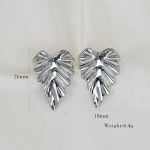 Detailed view of silver leaf stud earrings showing 26mm height and 18mm width dimensions