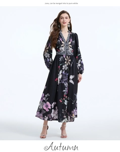 Macro shot of V-neck and floral pattern on black long sleeve vacation maxi dress