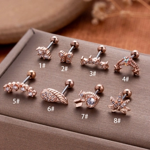 Rose gold stainless steel stud earrings set featuring zircon butterfly and star designs