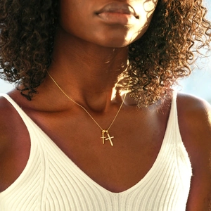 Minimalist S925 sterling silver double cross necklace with zircon on a model