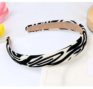 Close-up of zebra pattern knitted headband with soft anti-slip inner lining texture