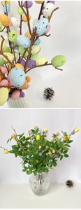 Detailed view of colorful speckled Easter foam eggs with green leaves for home decoration