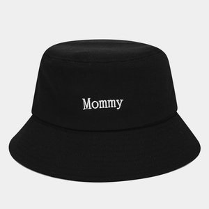 Classic black cotton bucket hat featuring white Mommy embroidery on the front center