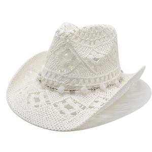White hollow-out straw cowboy hat with bohemian bead trim and wide brim for sun protection