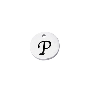Macro shot of mirror-polished silver stainless steel round charm with engraved letter P